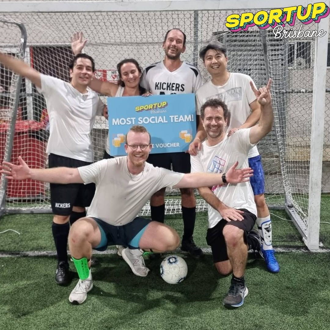 SportUP social soccer players celebrating in front of the goal after their 5-a-side game